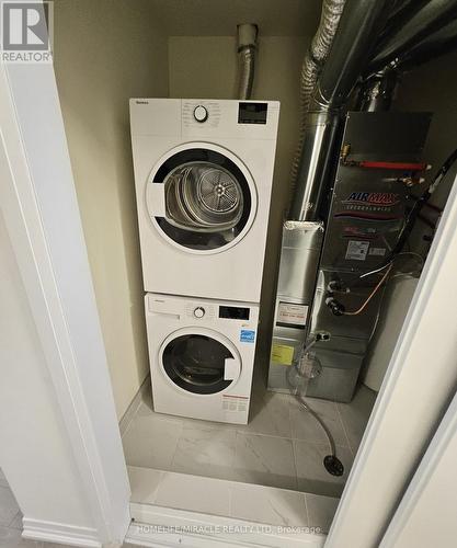 17 - 165 Tapscott Road, Toronto, ON - Indoor Photo Showing Laundry Room