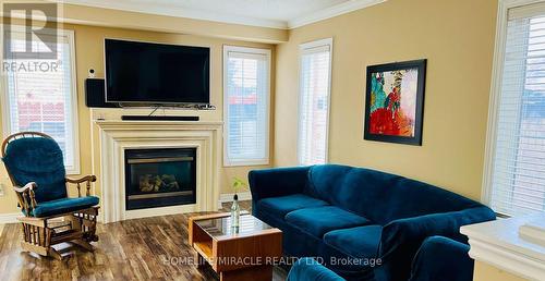 29 Brucewood Road, Brampton, ON - Indoor Photo Showing Living Room With Fireplace