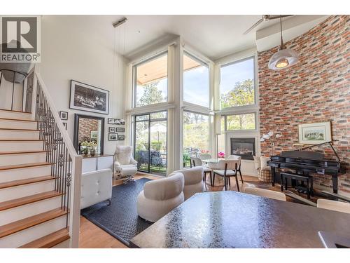 250 Marina Way Unit# 208, Penticton, BC - Indoor Photo Showing Other Room With Fireplace