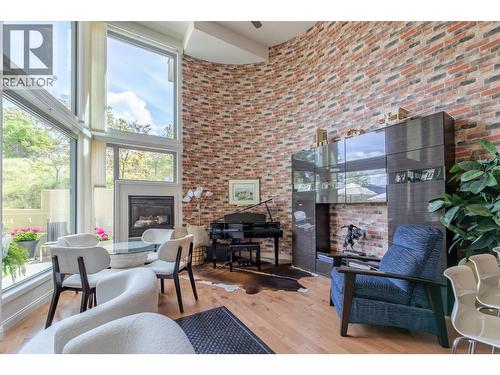 250 Marina Way Unit# 208, Penticton, BC - Indoor Photo Showing Other Room With Fireplace