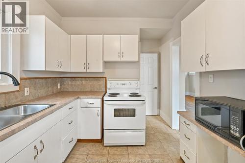 1575 Church Street, Windsor, ON - Indoor Photo Showing Kitchen With Double Sink