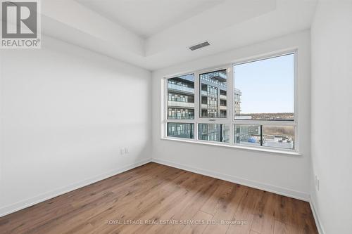 Bright Oversized Bedroom Offers a Walk-In Closet - 603 - 395 Dundas Street W, Oakville, ON 