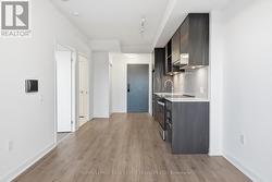 Modern Kitchen Features Whirlpool S/S Appliances - 