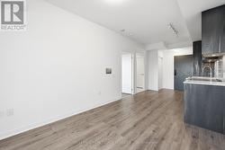 Wide-Plank Laminate Flooring Throughout - 