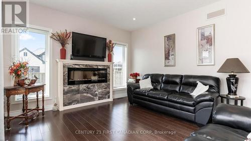102 Caverhill Crescent, Middlesex Centre (Komoka), ON - Indoor Photo Showing Living Room With Fireplace
