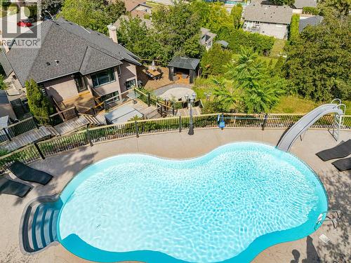 1791 Sprucegrove Court, Kelowna, BC - Outdoor With In Ground Pool
