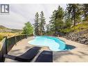 1791 Sprucegrove Court, Kelowna, BC  - Outdoor With In Ground Pool With Backyard 