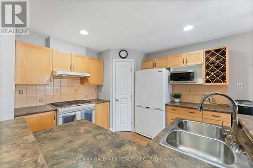 135 Tandalee Crescent, Ottawa, ON - Indoor Photo Showing Kitchen With Double Sink