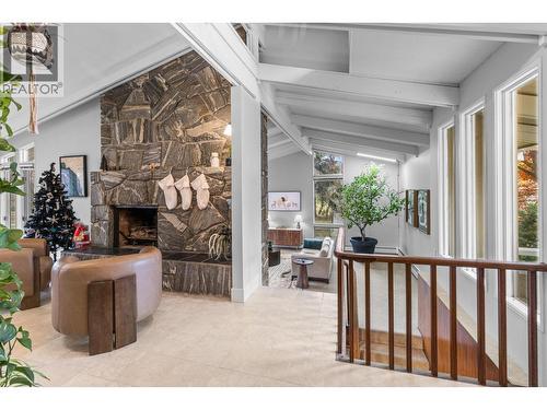 930 Fairway Crescent, Kelowna, BC - Indoor Photo Showing Other Room With Fireplace