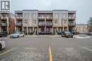 View of property featuring uncovered parking - 25 Isherwood Avenue Unit# G105, Cambridge, ON  - Outdoor With Facade 