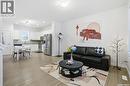 1044 Kolynchuk Crescent, Saskatoon, SK  - Indoor Photo Showing Living Room 