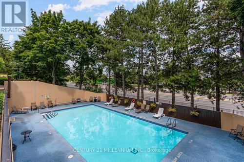 604 - 5 Lisa Street, Brampton, ON - Outdoor With In Ground Pool With Backyard