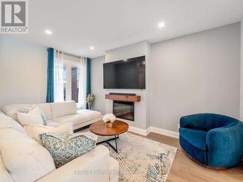 143 Chalfield Lane, Mississauga (Rathwood), ON - Indoor Photo Showing Living Room With Fireplace