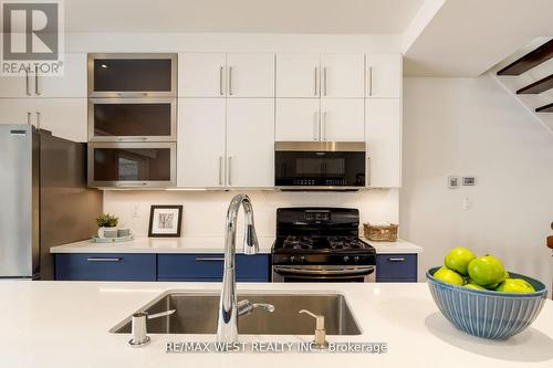 79 Springhurst Avenue, Toronto, ON - Indoor Photo Showing Kitchen With Double Sink
