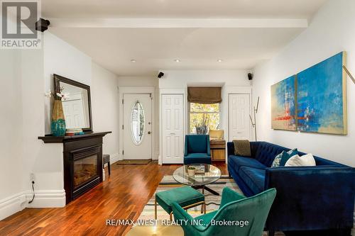 79 Springhurst Avenue, Toronto, ON - Indoor Photo Showing Living Room With Fireplace