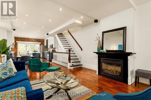 79 Springhurst Avenue, Toronto, ON - Indoor Photo Showing Living Room With Fireplace