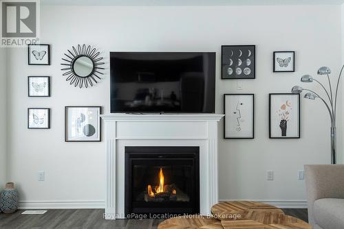 gas fireplace with mantel - 17 Catamaran Drive, Wasaga Beach, ON 