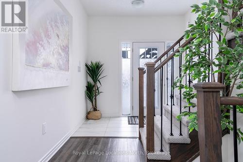 Tiled bright entrance foyer with closet - 17 Catamaran Drive, Wasaga Beach, ON 