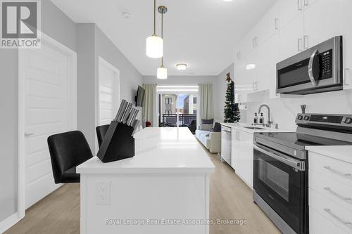 216 - 470 Gordon Krantz Avenue, Milton, ON - Indoor Photo Showing Kitchen With Double Sink With Upgraded Kitchen