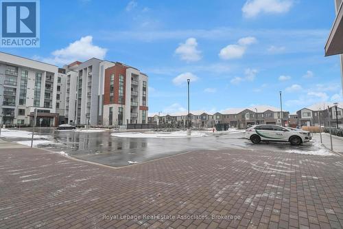 216 - 470 Gordon Krantz Avenue, Milton, ON - Outdoor With Facade