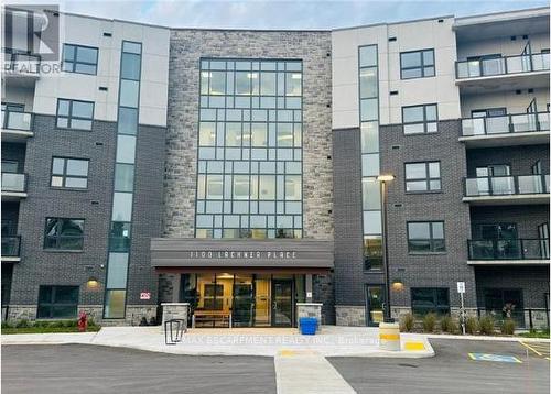 211 - 1100 Lackner Place, Kitchener, ON - Outdoor With Balcony With Facade