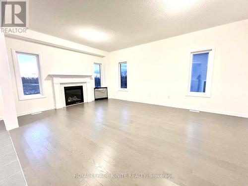104 Windermere Boulevard, Loyalist, ON - Indoor Photo Showing Living Room With Fireplace