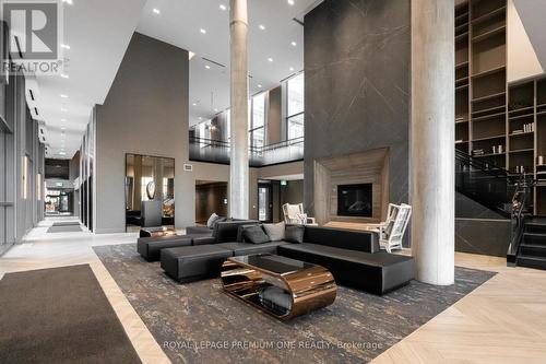 406 - 2450 Old Bronte Road, Oakville, ON - Indoor Photo Showing Other Room With Fireplace