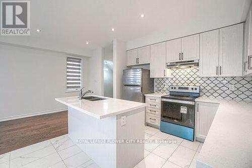 Upper - 37 Hashmi Place, Brampton, ON - Indoor Photo Showing Kitchen With Double Sink