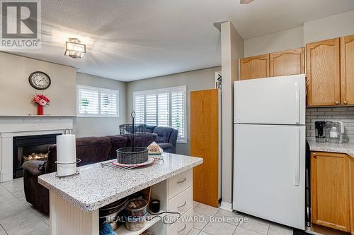 102 - 106 Anne Street, Cobourg, ON - Indoor Photo Showing Kitchen With Fireplace