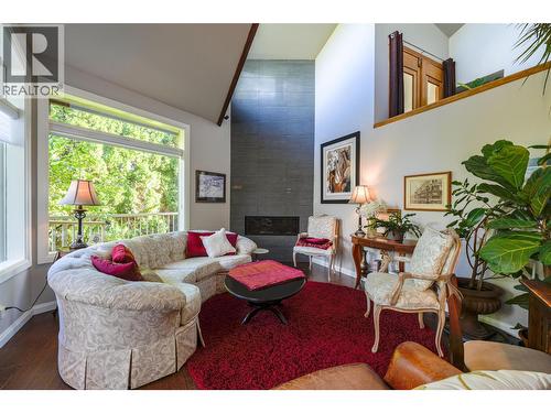 Living Room looking towards the Foyer entrance above . - 14038 Ponderosa Way, Coldstream, BC - Indoor