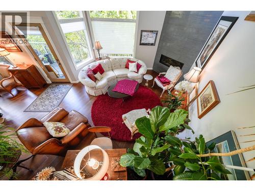 View looking down from the Foyer to the Living room with Cathedral Ceiling - 14038 Ponderosa Way, Coldstream, BC - Indoor Photo Showing Living Room