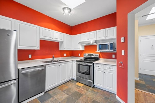 406-220 Island Hwy West, Parksville, BC - Indoor Photo Showing Kitchen With Stainless Steel Kitchen With Double Sink