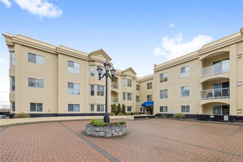 406-220 Island Hwy West, Parksville, BC - Outdoor With Balcony With Facade