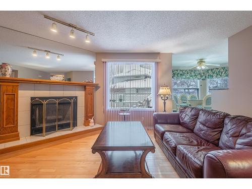 31 Harwood Dr, St. Albert, AB - Indoor Photo Showing Living Room With Fireplace