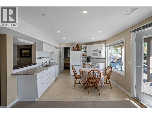 Lower level in-law suite (vacation suite) - 1988 Dewdney Road, Kelowna, BC - Indoor Photo Showing Dining Room