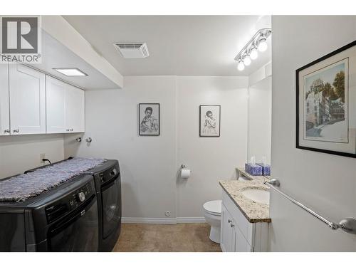 Lower level bathroom/laundry room - 1988 Dewdney Road, Kelowna, BC - Indoor Photo Showing Bathroom