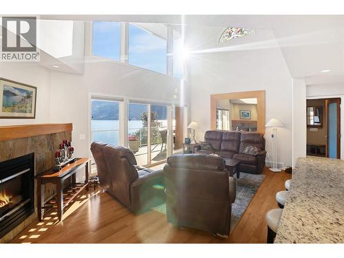 1988 Dewdney Road, Kelowna, BC - Indoor Photo Showing Living Room With Fireplace
