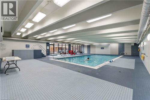View of indoor pool - 120 Duke Street Unit# 905, Hamilton, ON - Indoor Photo Showing Other Room With In Ground Pool