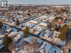Snowy aerial view featuring a residential view - 