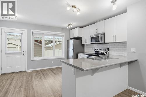 3429 Green Lavender Drive, Regina, SK - Indoor Photo Showing Kitchen With Double Sink With Upgraded Kitchen
