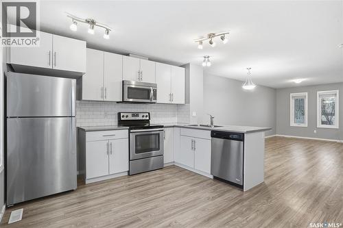3429 Green Lavender Drive, Regina, SK - Indoor Photo Showing Kitchen With Double Sink With Upgraded Kitchen