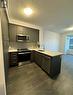 205 - 3220 William Coltson Avenue, Oakville, ON  - Indoor Photo Showing Kitchen With Stainless Steel Kitchen 
