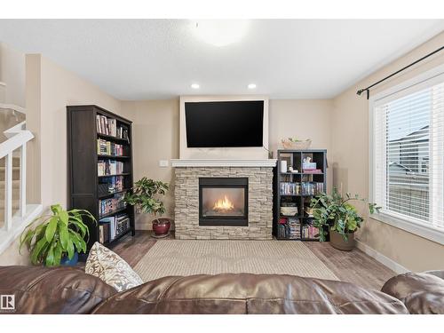 140 Axbridge Ga, Sherwood Park, AB - Indoor Photo Showing Living Room With Fireplace