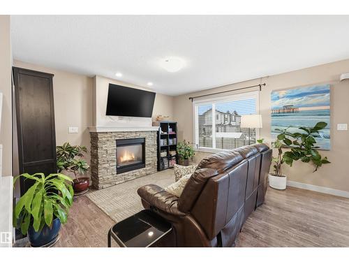 140 Axbridge Ga, Sherwood Park, AB - Indoor Photo Showing Living Room With Fireplace