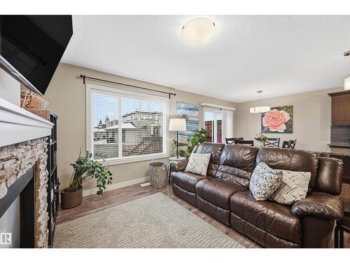 140 Axbridge Ga, Sherwood Park, AB - Indoor Photo Showing Living Room With Fireplace