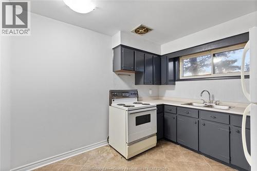 1400-1430 Seneca Street, Windsor, ON - Indoor Photo Showing Kitchen With Double Sink