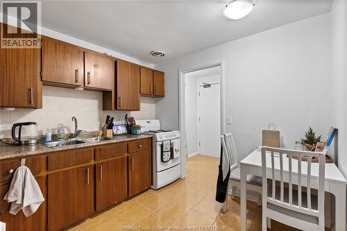 1400-1430 Seneca Street, Windsor, ON - Indoor Photo Showing Kitchen With Double Sink