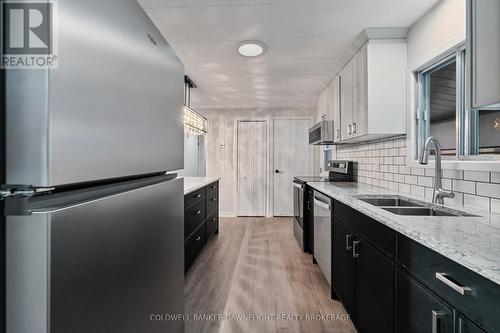 12 Redford Drive, South Huron (Exeter), ON - Indoor Photo Showing Kitchen With Double Sink