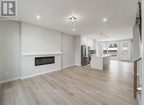 9145 154 St. Sw, Edmonton, AB - Indoor Photo Showing Other Room With Fireplace