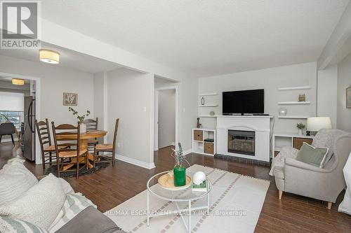 15 - 565 Guelph Line, Burlington, ON - Indoor Photo Showing Living Room With Fireplace